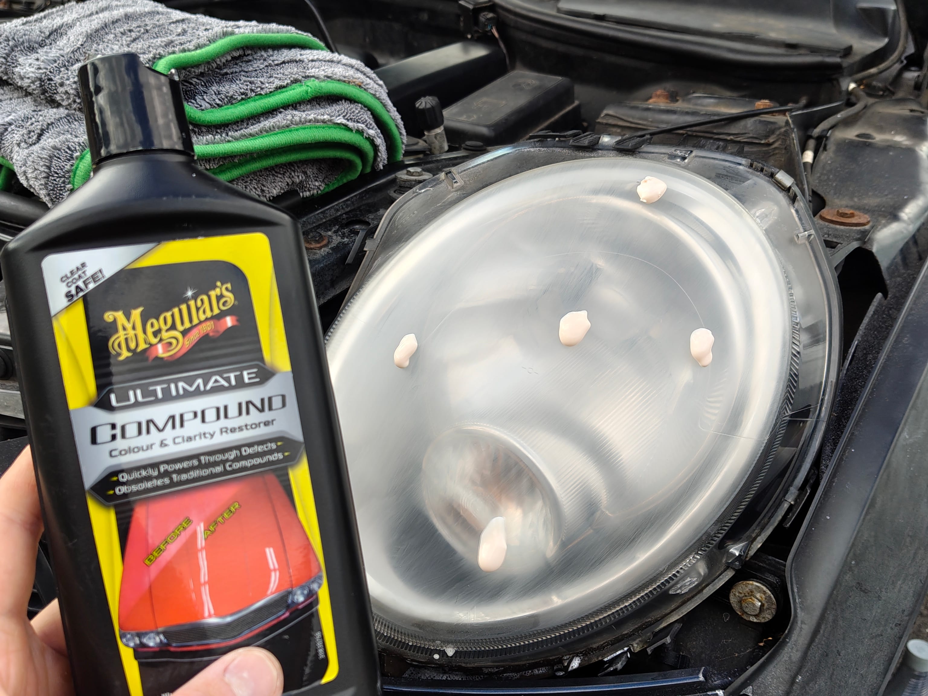 Step 3: dots of meguiars utlimate compound on a headlight