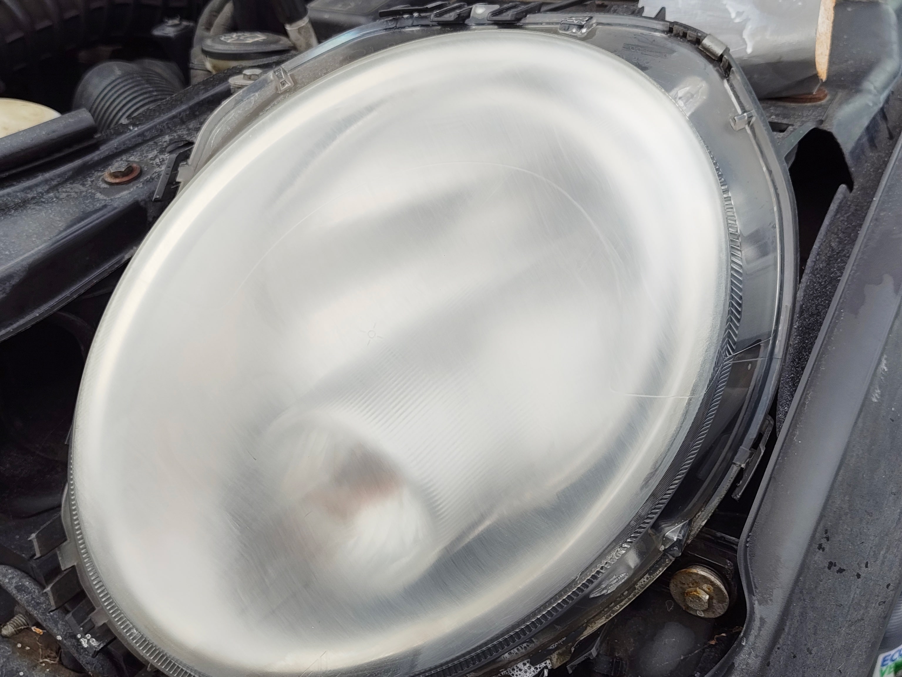 Even glaze headlights after sanding