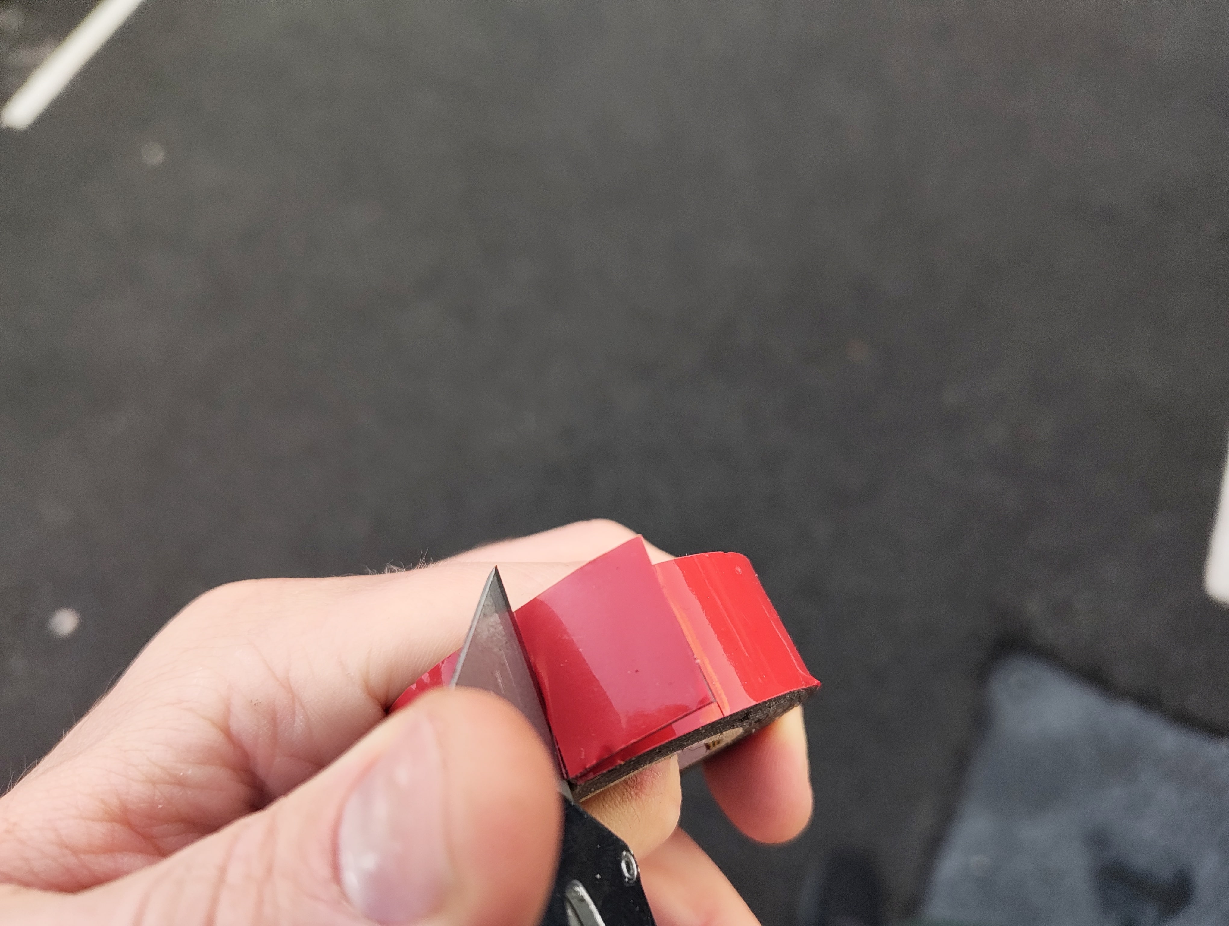 Cutting exterior tape with stanley knife